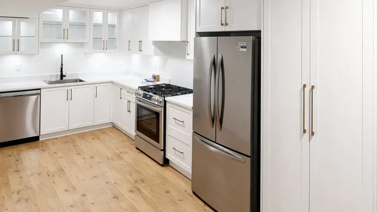 A modern kitchen inside a newly built legal basement secondary suite in Port Moody