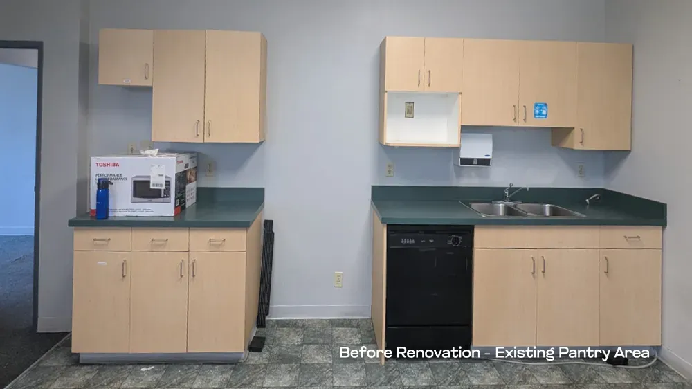 View of the original staff pantry and breakroom area before starting the commercial renovation project.