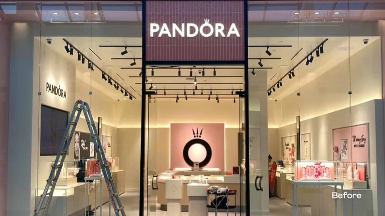 Retail jewellery store interior under construction with a ladder, track lighting and display fixtures before opening in Vancouver, BC, by PCC Contracting. β before